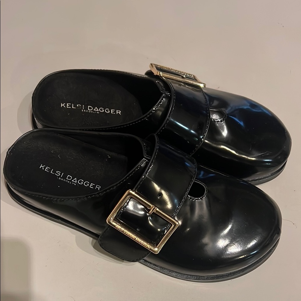 Kelsi Dagger Black Mules with Gold Accent